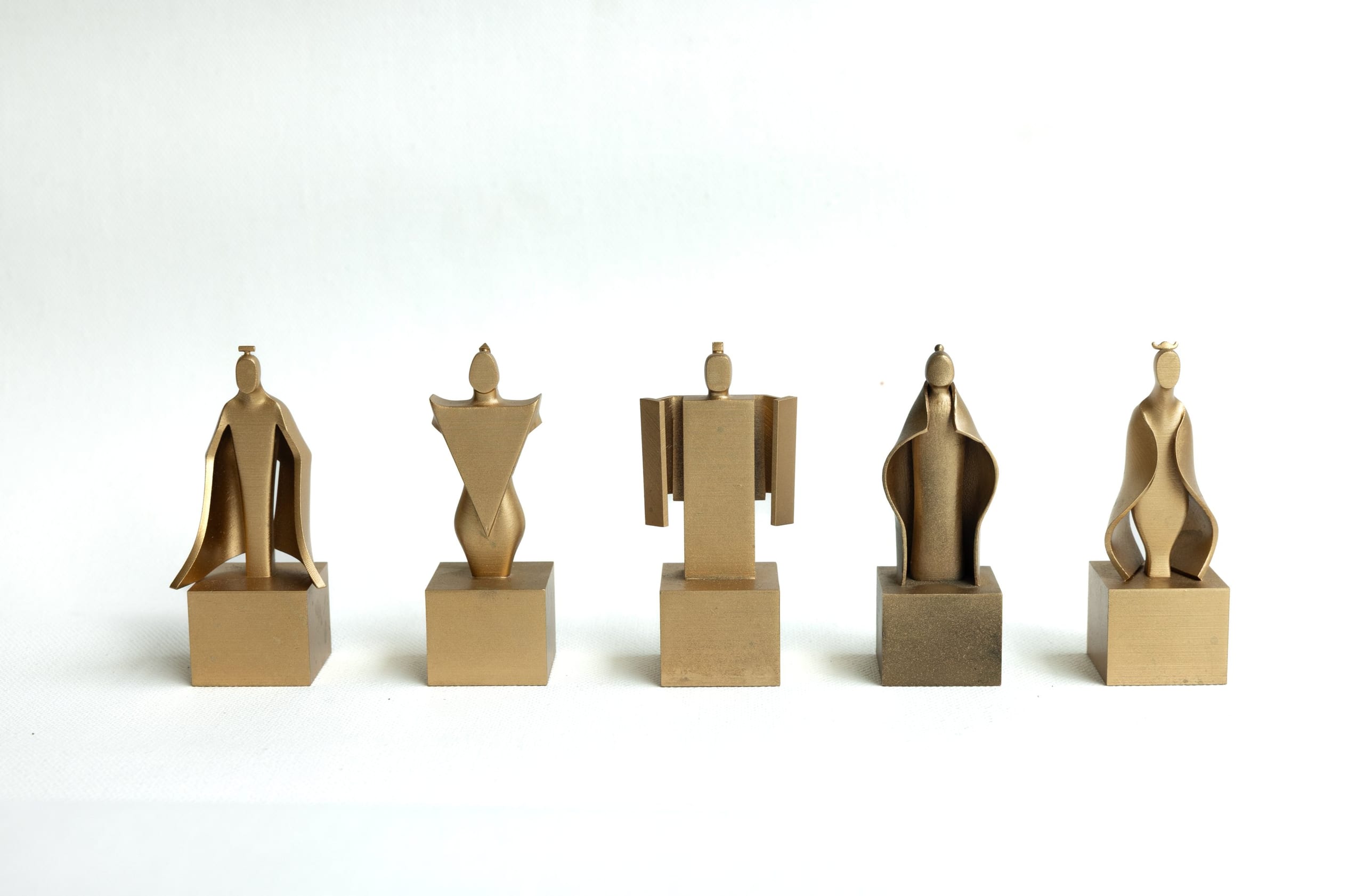 Seated Ancestors — five figure studies on cubes