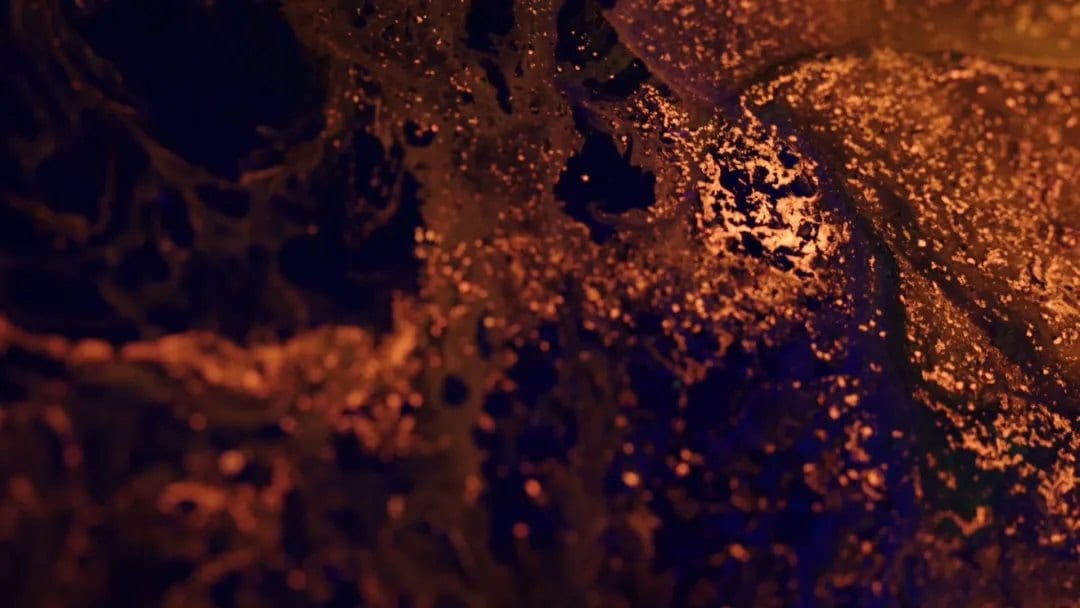 Mineral pigment catching the light — macro
